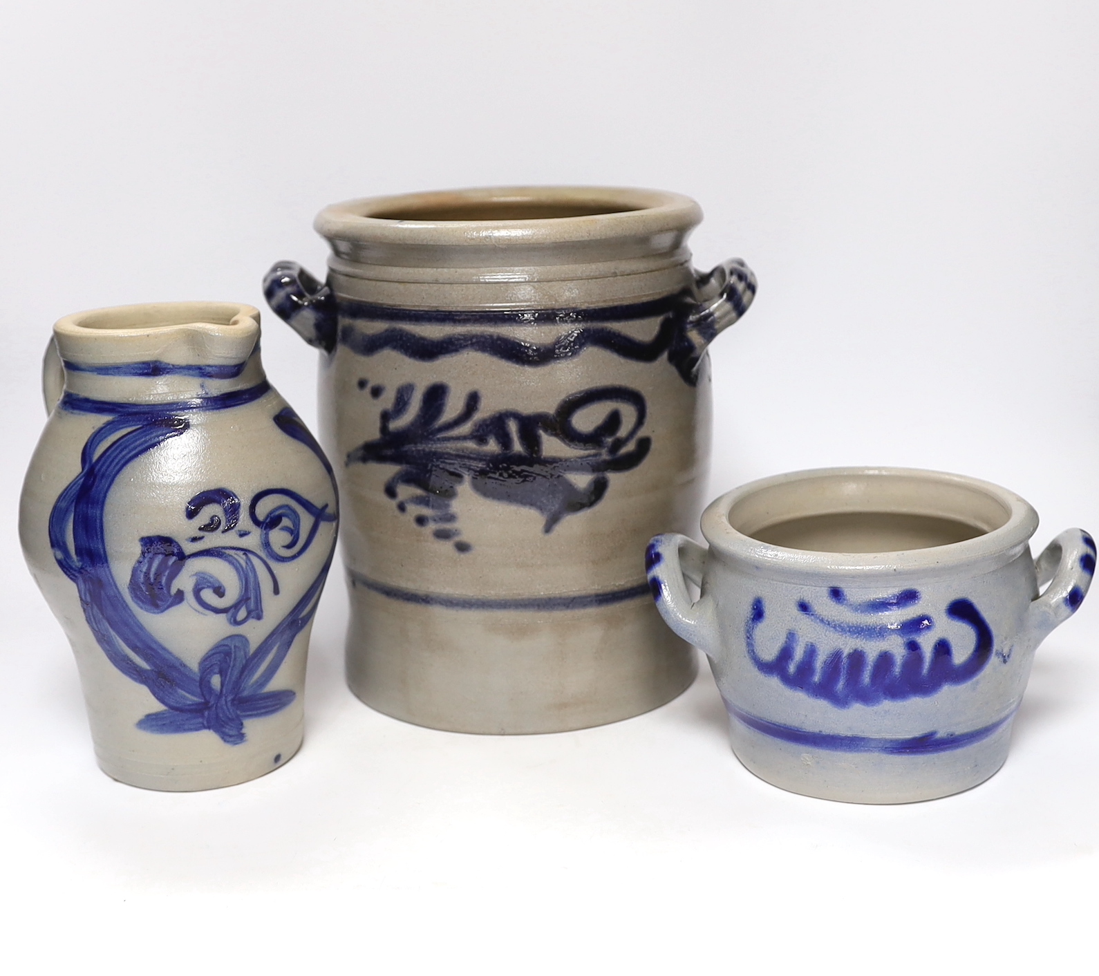 Three 19th century German saltglaze vessels, 23cm